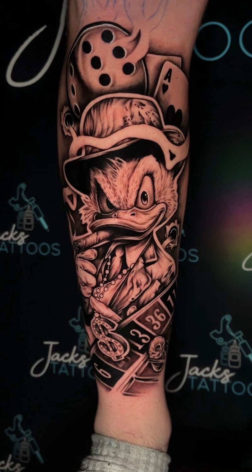 Black and grey gangster Scrooge McDuck gambling tattoo