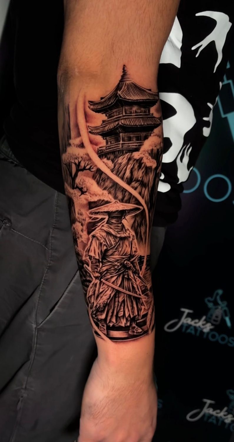 Black and grey Japanese samurai and pagoda forearm sleeve tattoo